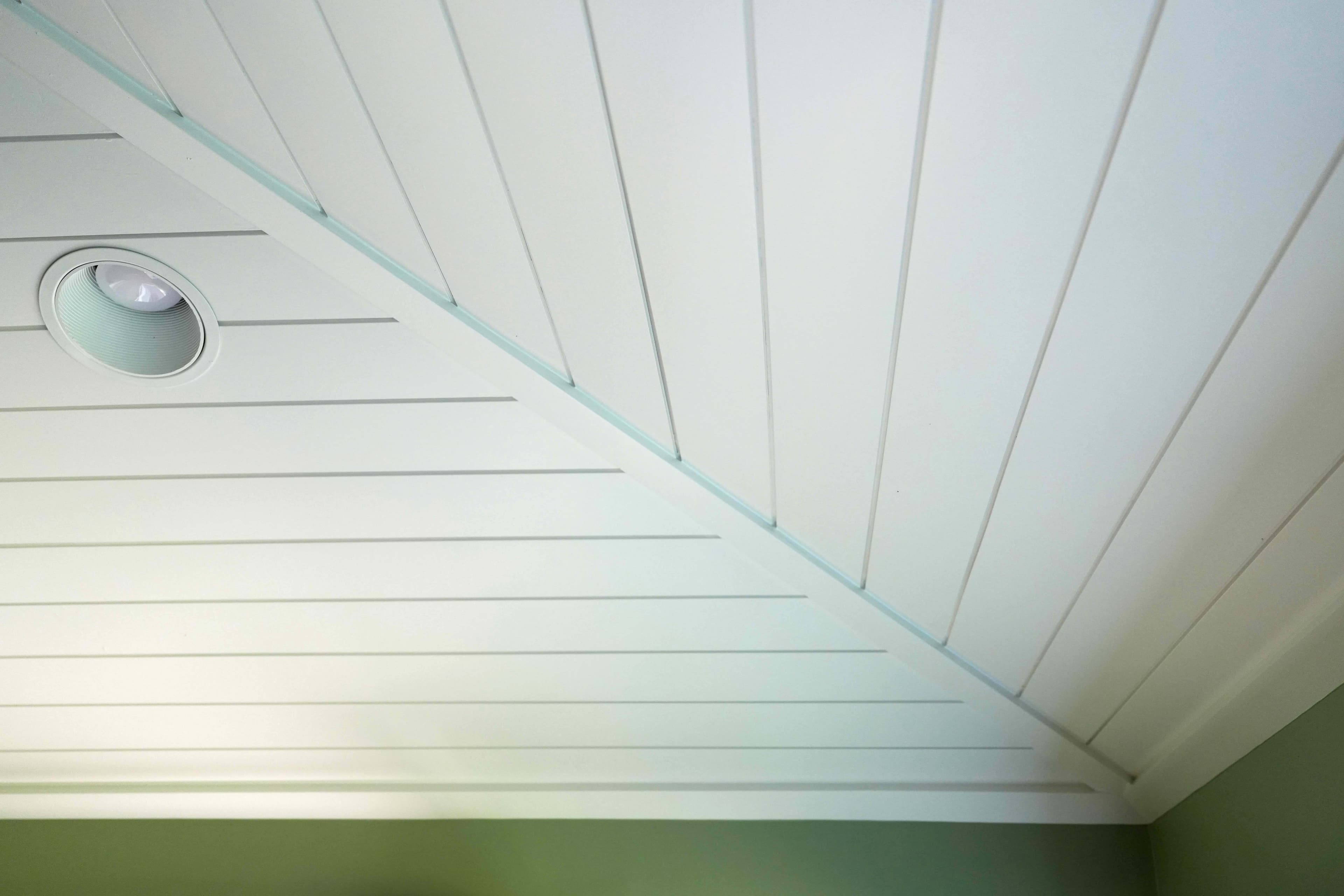 Sunroom Ceiling. Sunroom ceiling with crisp white shiplap and exposed wood beams, Franconia, PA