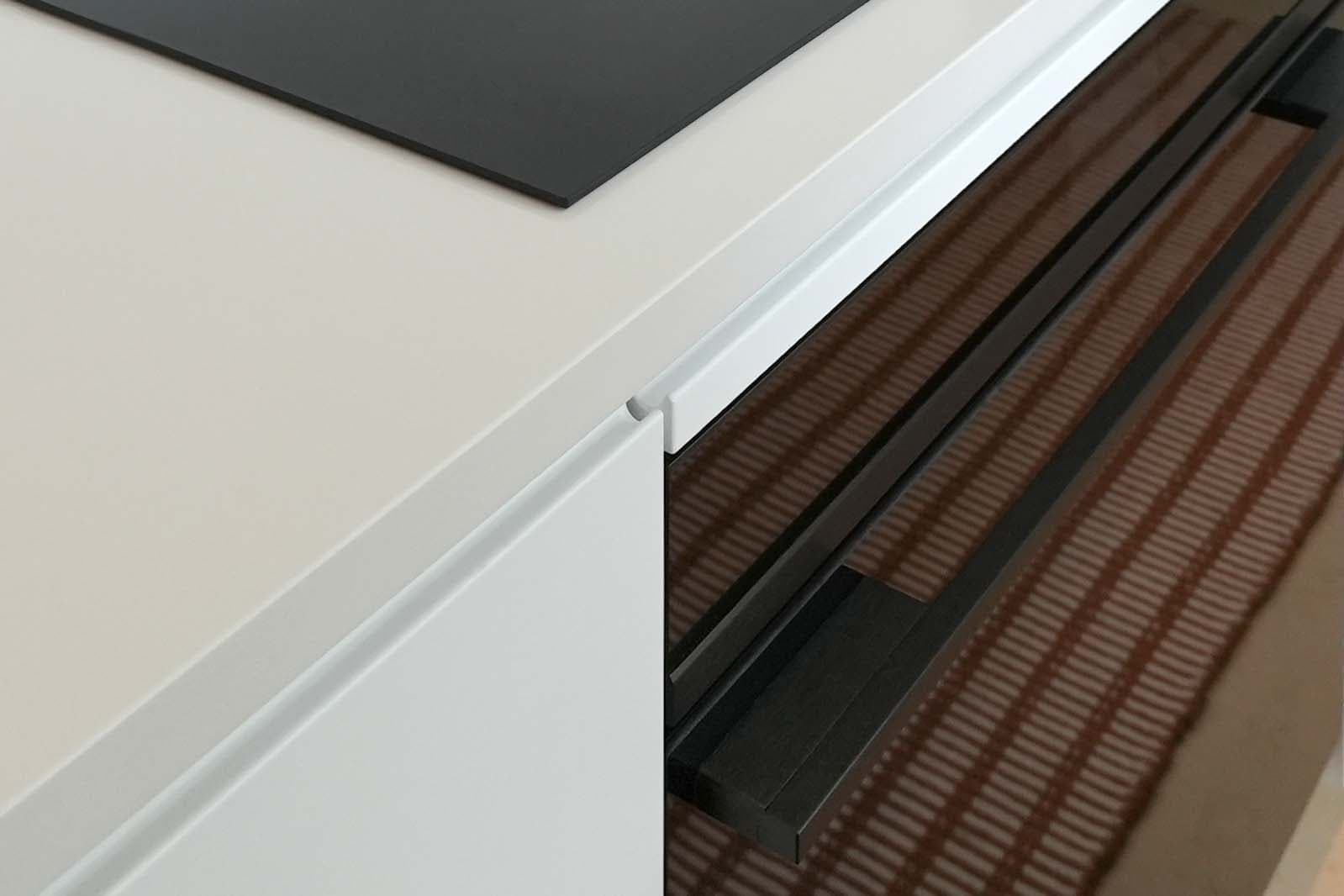 Minimalist Kitchen. Minimalist kitchen with flat-panel cabinetry and a wooded view, Wayne, PA