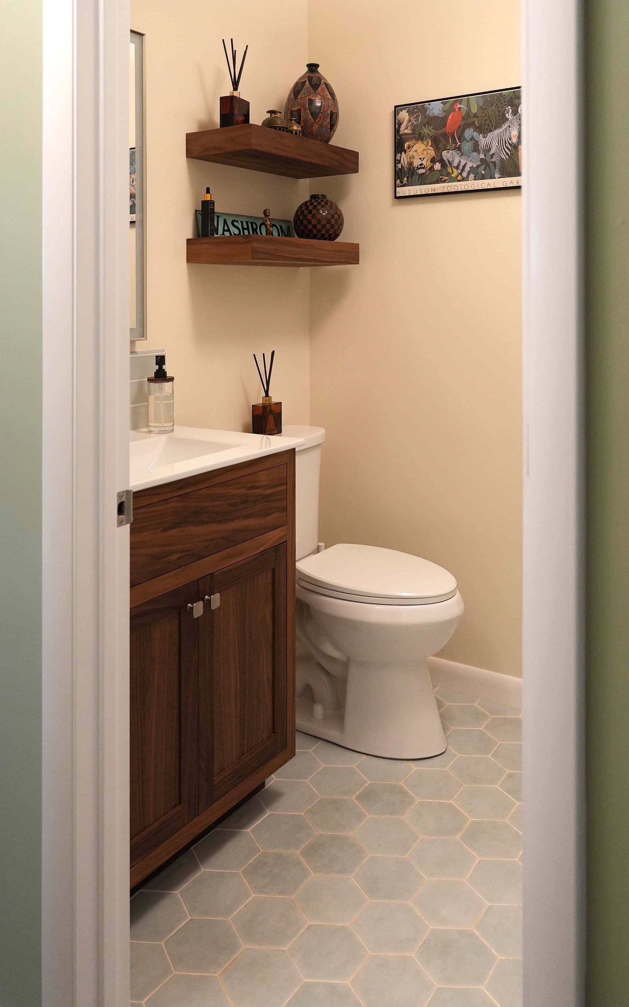 Modernized Primary Bath. Modernized primary bath with custom oak cabinetry over 1950s tile, Franconia, PA